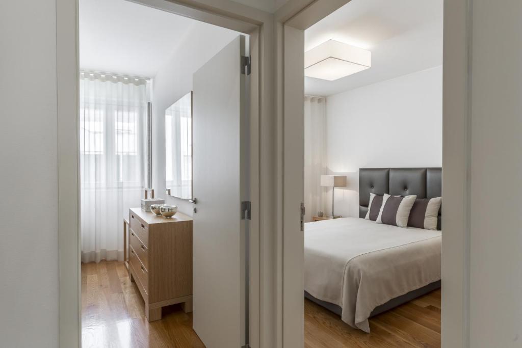 Postel nebo postele na pokoji v ubytování MyPlaceLisbon - Luxury Castle Apartment