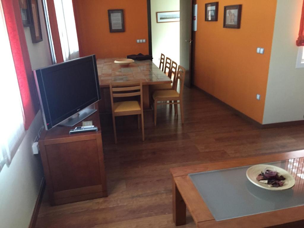 Televízia a/alebo spoločenská miestnosť v ubytovaní La Casa El Yelmo De Mambrino