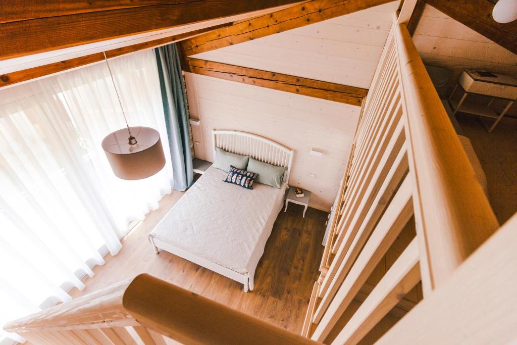 Posteľ alebo postele v izbe v ubytovaní b&b al fienile