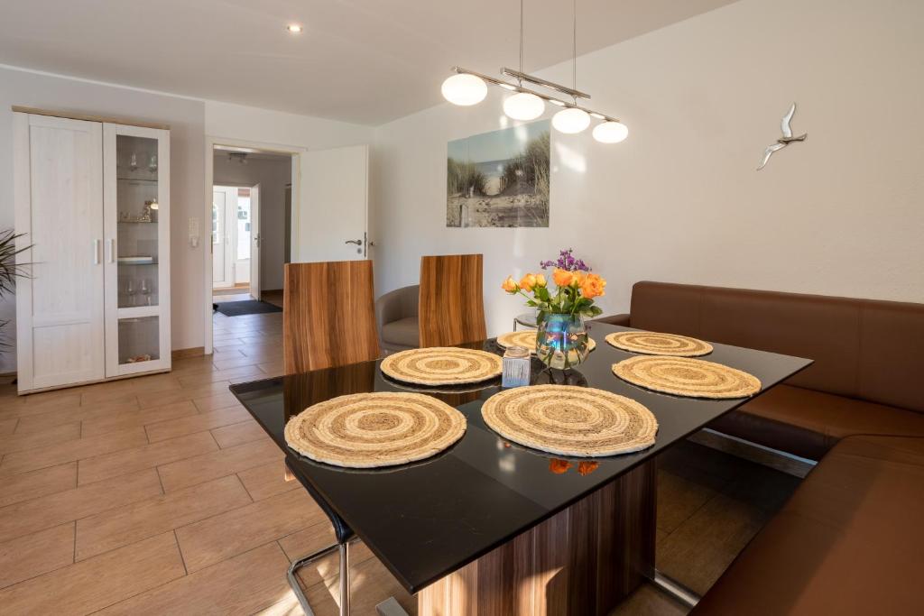 Η κουζίνα ή μικρή κουζίνα στο Ferienhaus Robbenglück in Tossens - Ihr gemütliches Zuhause an der Nordsee