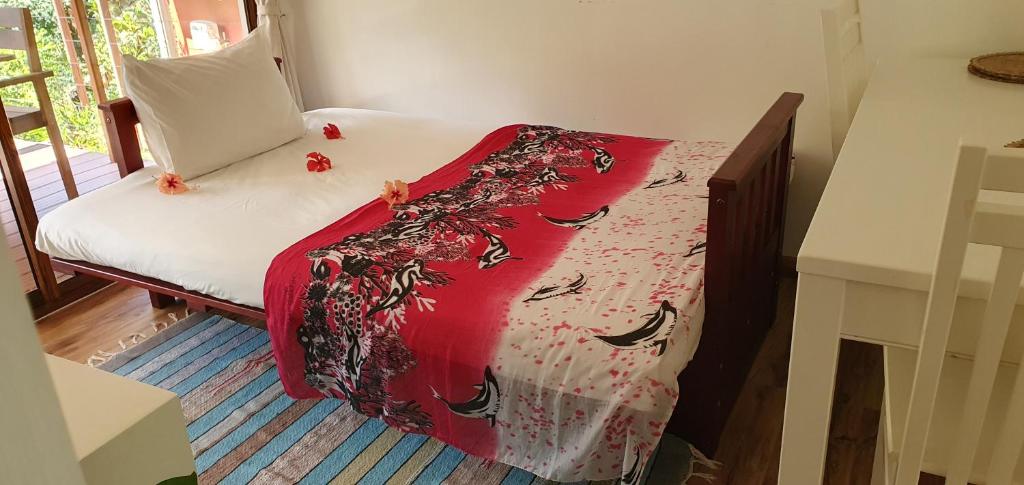 Postel nebo postele na pokoji v ubytování Cashew Nut Grove Chalets