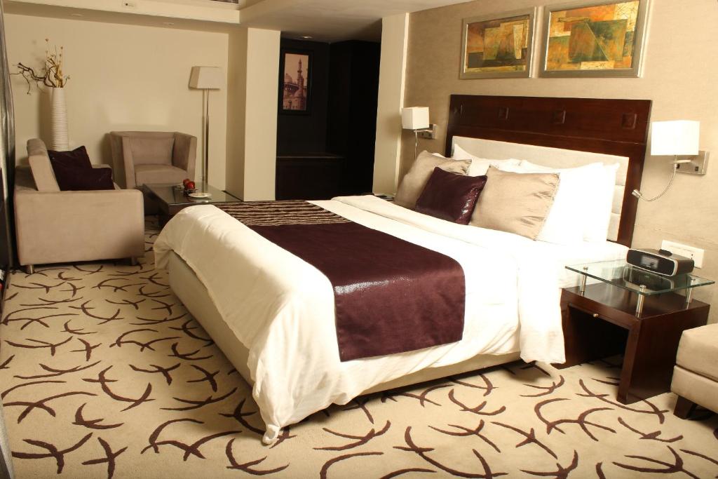 Postel nebo postele na pokoji v ubytování Fortune Park, Ahmedabad - Member ITC Hotels' Group