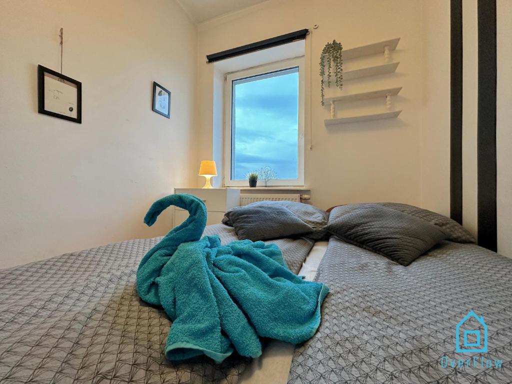 Кровать или кровати в номере Swan Room