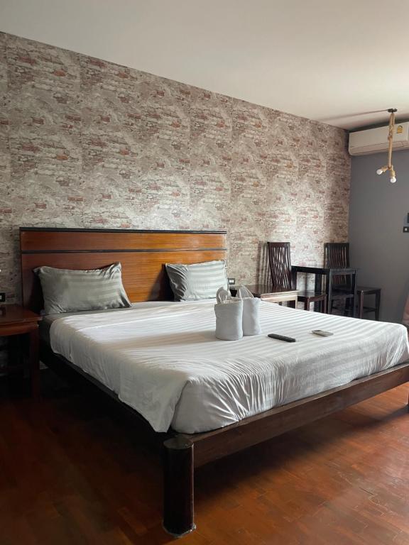 Ένα ή περισσότερα κρεβάτια σε δωμάτιο στο Retro guesthouse