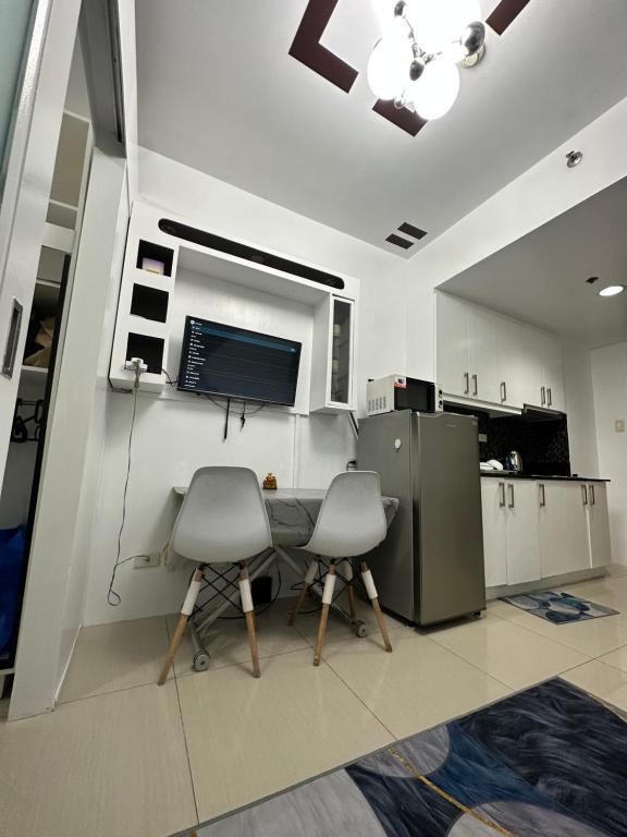 Kuchyň nebo kuchyňský kout v ubytování Shell Residences Staycation