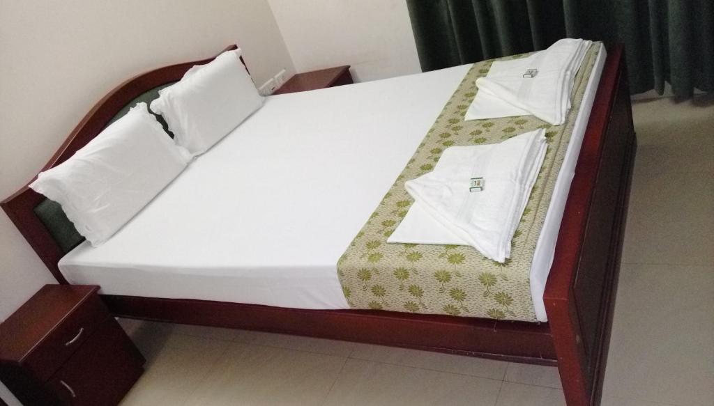 Postel nebo postele na pokoji v ubytování Elim Homestay Fort Kochi