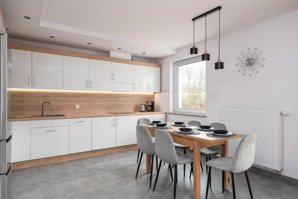Η κουζίνα ή μικρή κουζίνα στο Apartament GOJA Podzamcze