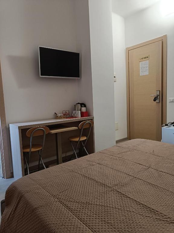 TV a/nebo společenská místnost v ubytování Le Coccole