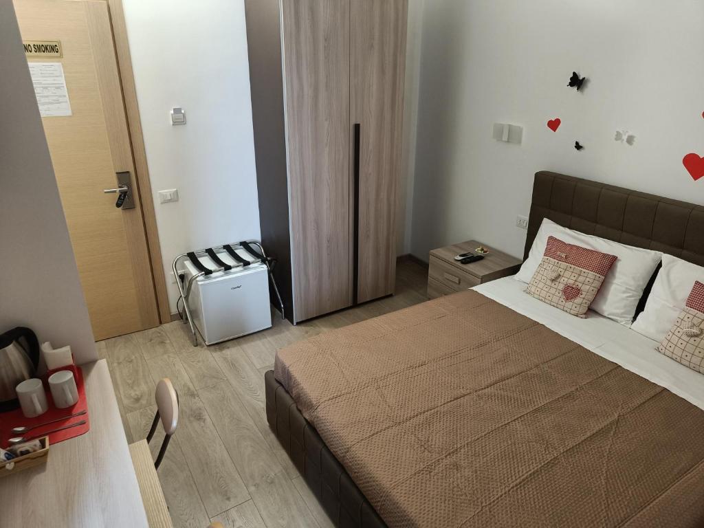 Postel nebo postele na pokoji v ubytování Le Coccole