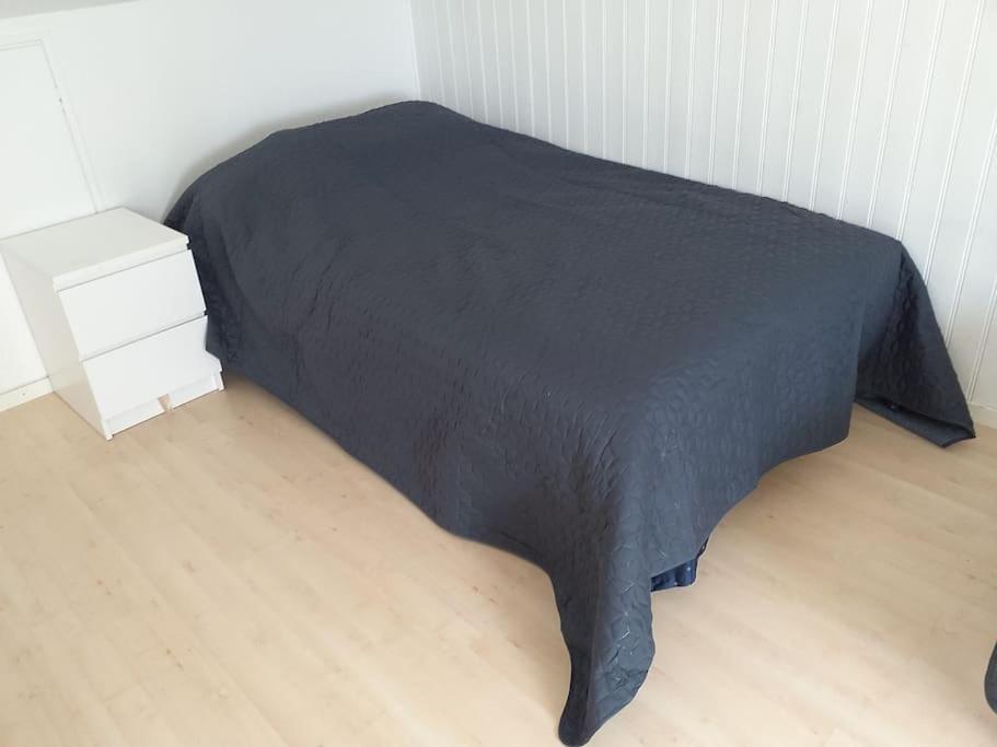 Postel nebo postele na pokoji v ubytování Veberöd Centrum Apartment
