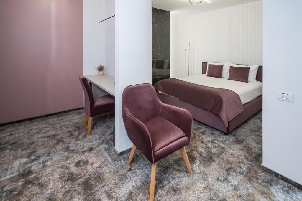 Postel nebo postele na pokoji v ubytování ALIVE HOTEL
