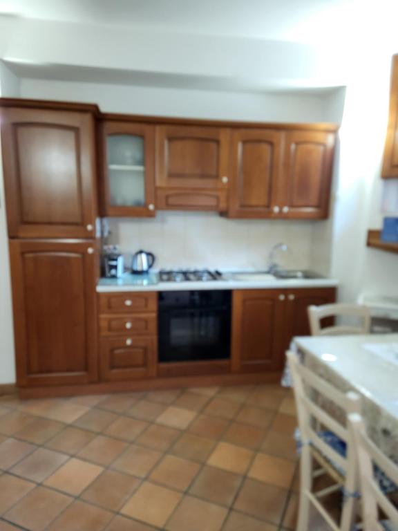Kuchyň nebo kuchyňský kout v ubytování La Torre Nomipesciolini