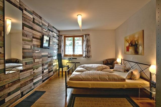 Postel nebo postele na pokoji v ubytování Schnider Bed&Breakfast und Café