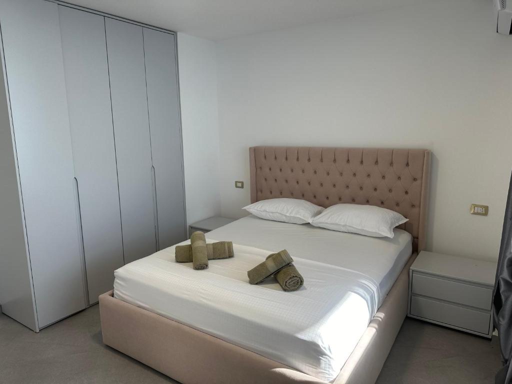 Posteľ alebo postele v izbe v ubytovaní Seafront Blue Duplex