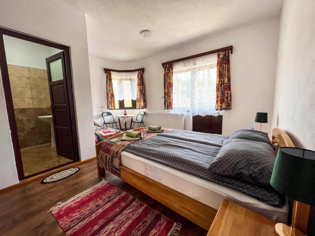Postel nebo postele na pokoji v ubytování Casa Forrás