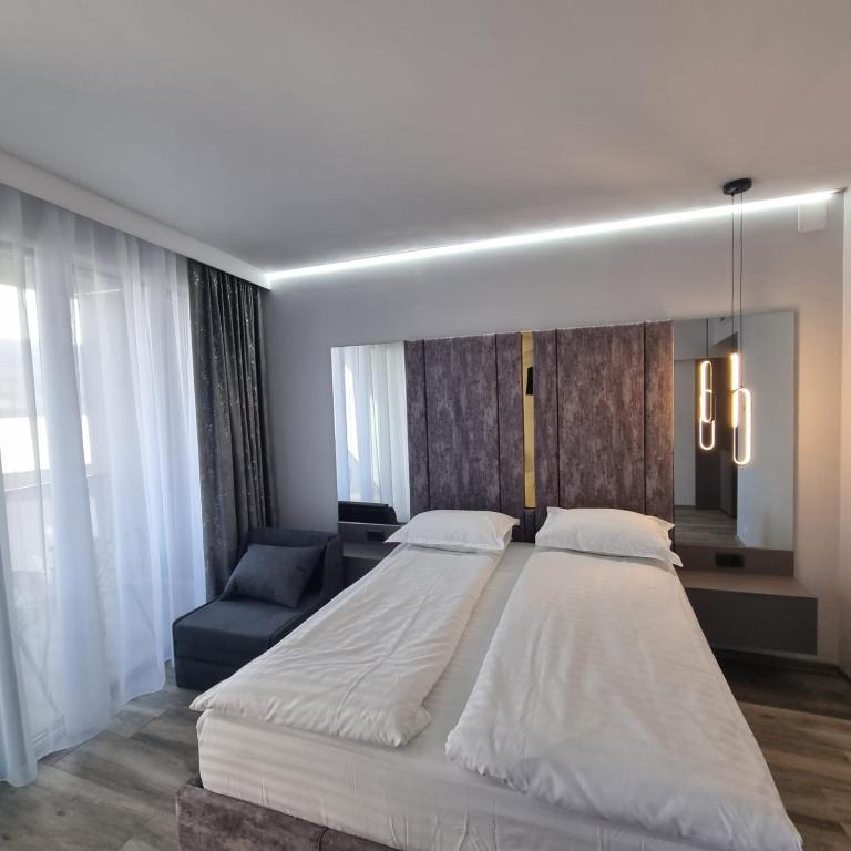 Postel nebo postele na pokoji v ubytování Donau Resort