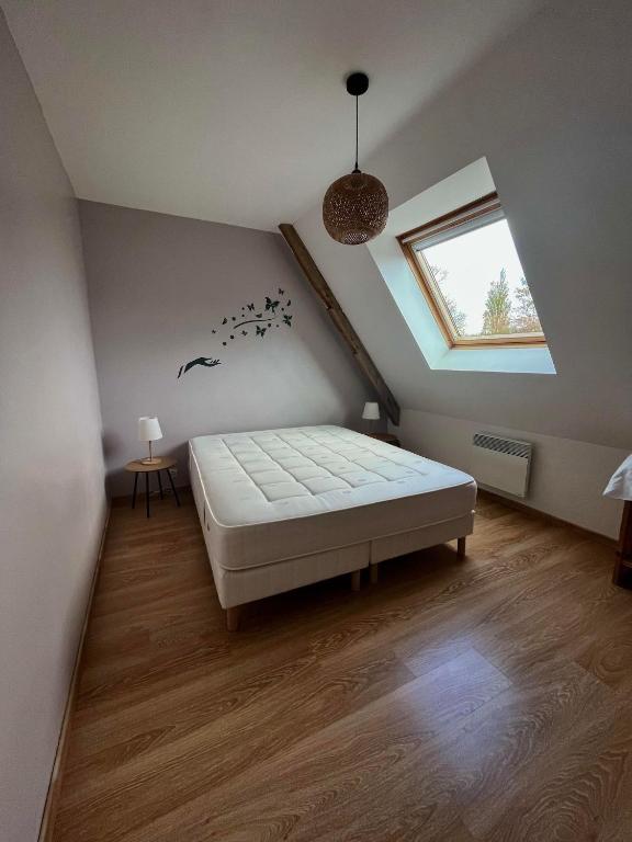 Postel nebo postele na pokoji v ubytování Les Buissonnets - Mer & Campagne - Maison de vacances - 2 chambres - 1 salon - 1 salle de bains - 1 cuisine - 72 m2
