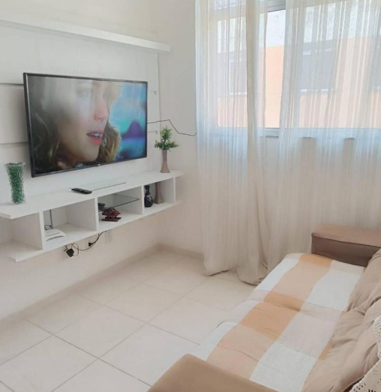 Телевізор і / або розважальний центр в Apartamento em Lauro de Freitas bem localizado