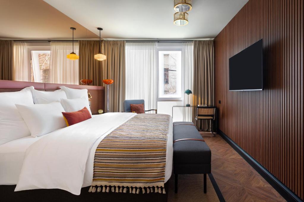 Postel nebo postele na pokoji v ubytování Artizan - Design Hotel