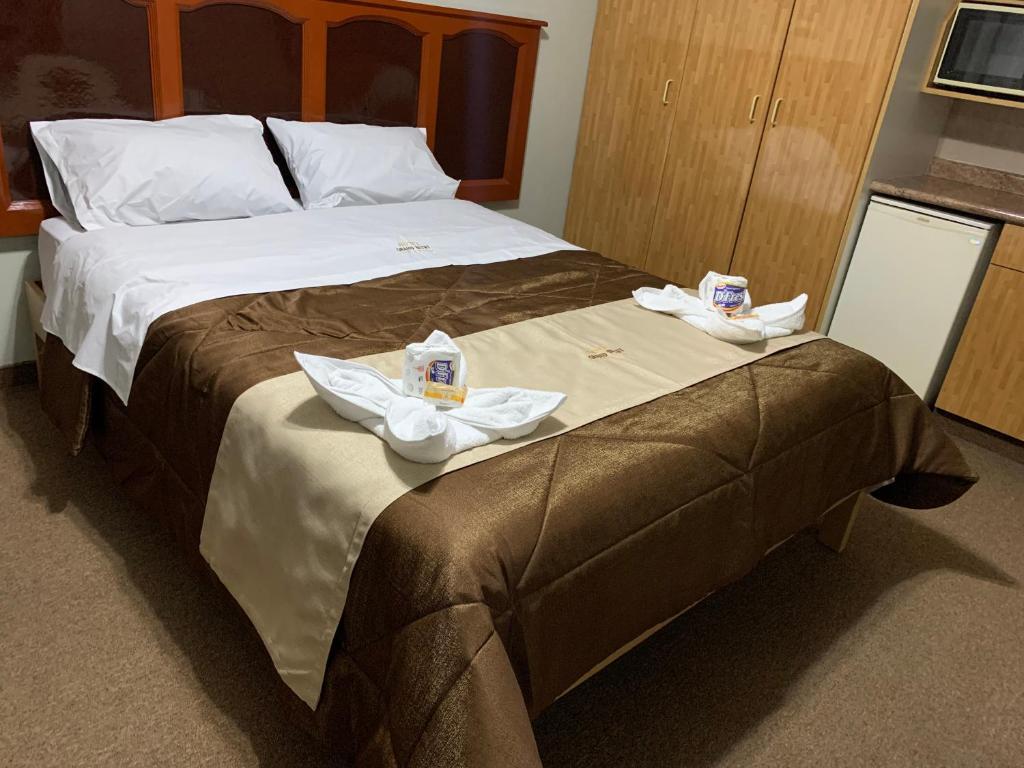 Postel nebo postele na pokoji v ubytování Grand Hotel Betsy