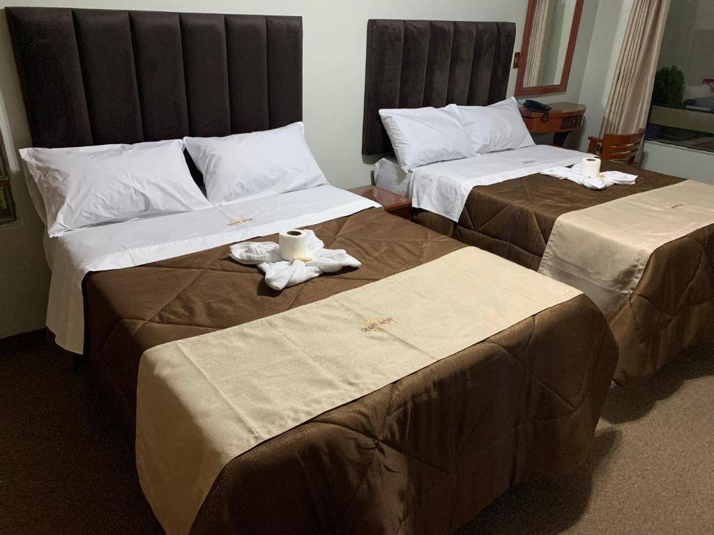 Postel nebo postele na pokoji v ubytování Grand Hotel Betsy