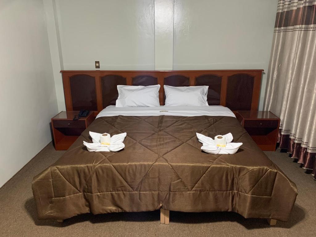 Postel nebo postele na pokoji v ubytování Grand Hotel Betsy
