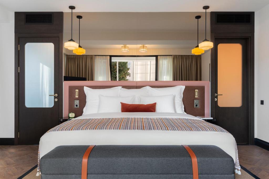 Postel nebo postele na pokoji v ubytování Artizan - Design Hotel