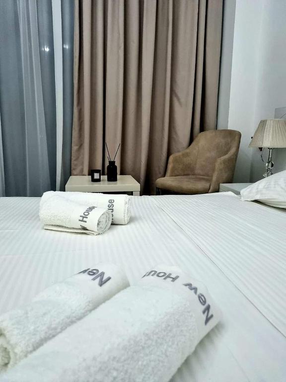 Postel nebo postele na pokoji v ubytování New House Kobuleti