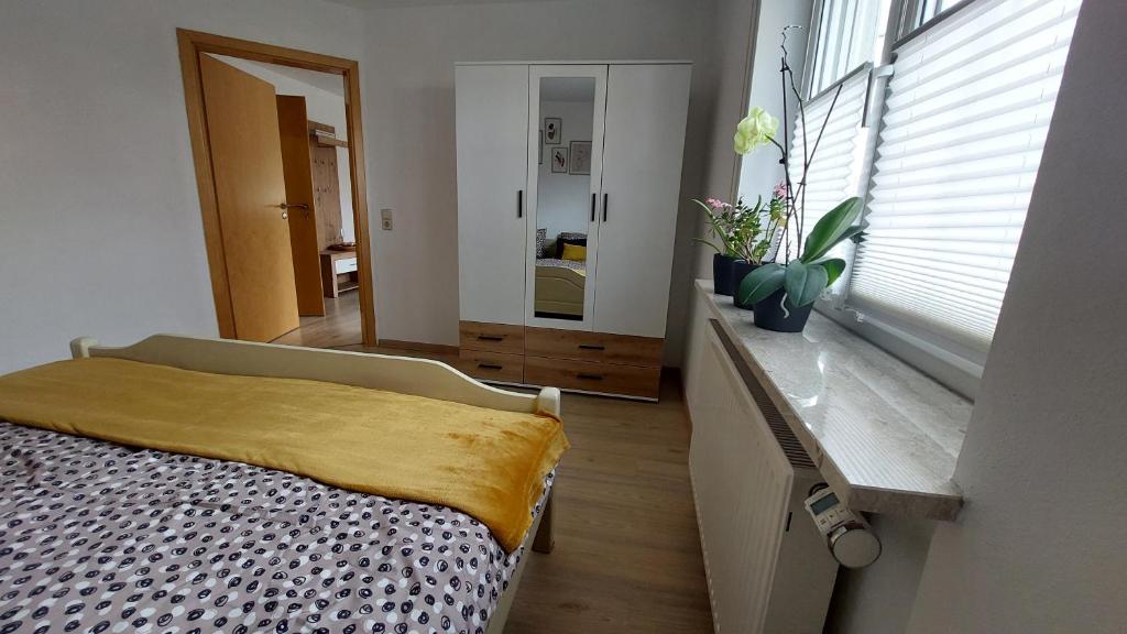 Postel nebo postele na pokoji v ubytování Ferienwohnung Mutz
