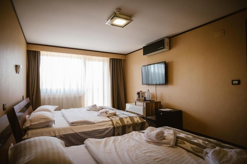 Postel nebo postele na pokoji v ubytování Bellacya Resort & Spa