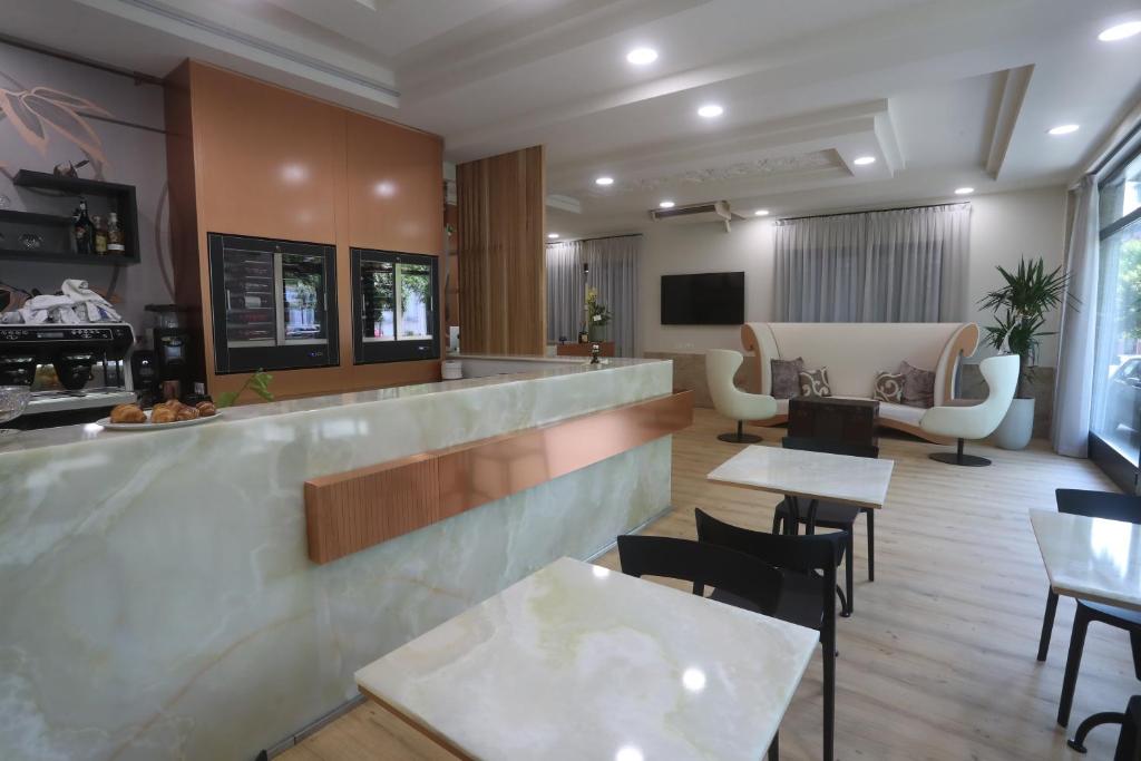 TV a/nebo společenská místnost v ubytování Hotel Central Giacomini