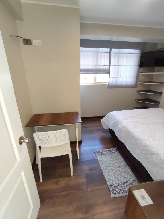 Postel nebo postele na pokoji v ubytování Casa Alojamiento Tocllaraju