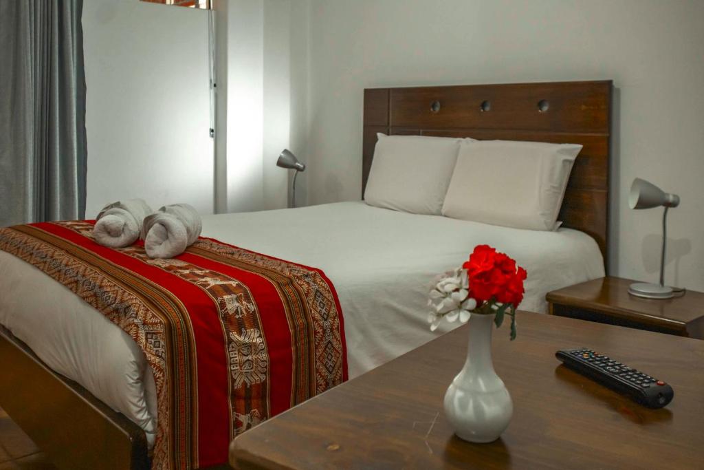 Postel nebo postele na pokoji v ubytování Hotel Del Prado Hometown