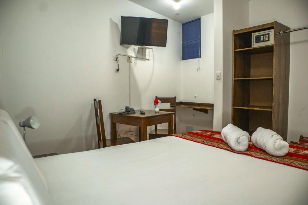 Postel nebo postele na pokoji v ubytování Hotel Del Prado Hometown