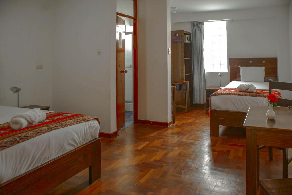 Postel nebo postele na pokoji v ubytování Hotel Del Prado Hometown