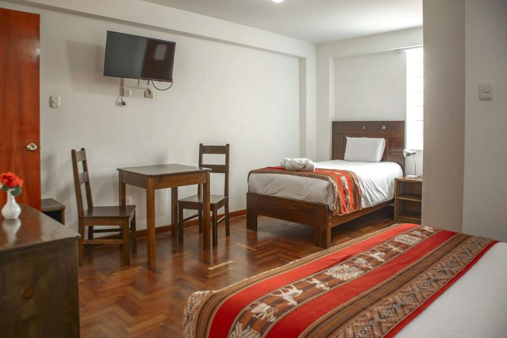 Postel nebo postele na pokoji v ubytování Hotel Del Prado Hometown