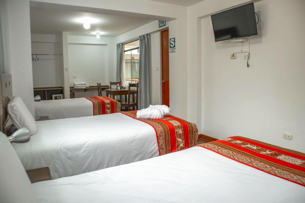 Postel nebo postele na pokoji v ubytování Hotel Del Prado Hometown