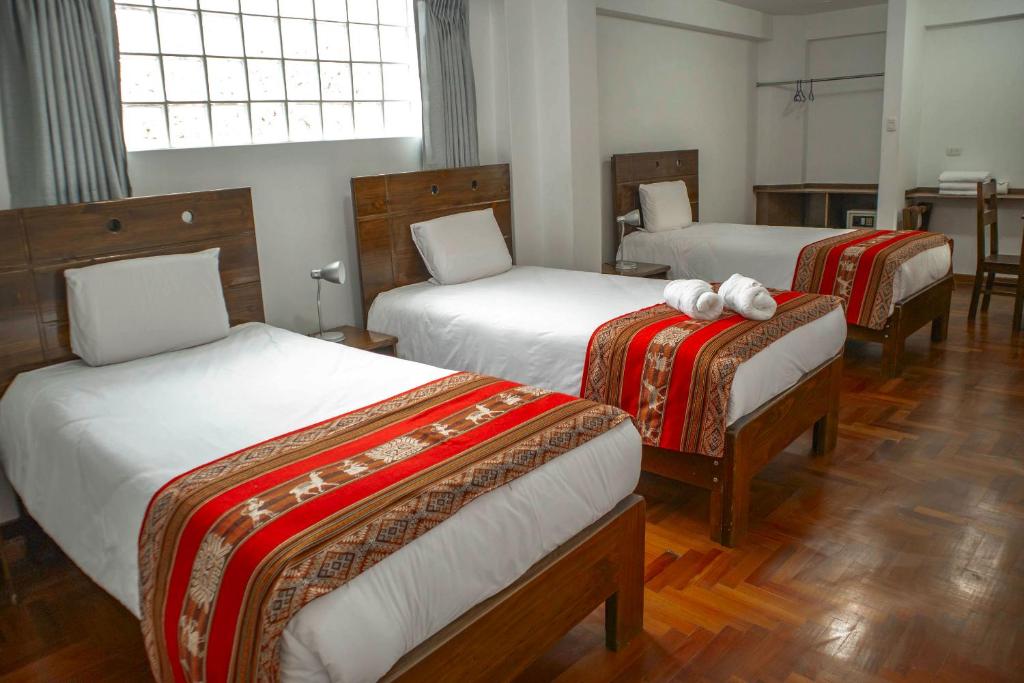 Postel nebo postele na pokoji v ubytování Hotel Del Prado Hometown