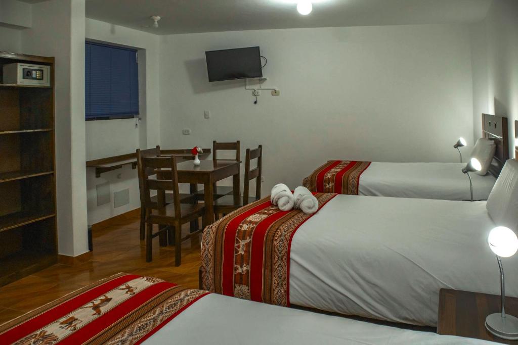 Postel nebo postele na pokoji v ubytování Hotel Del Prado Hometown
