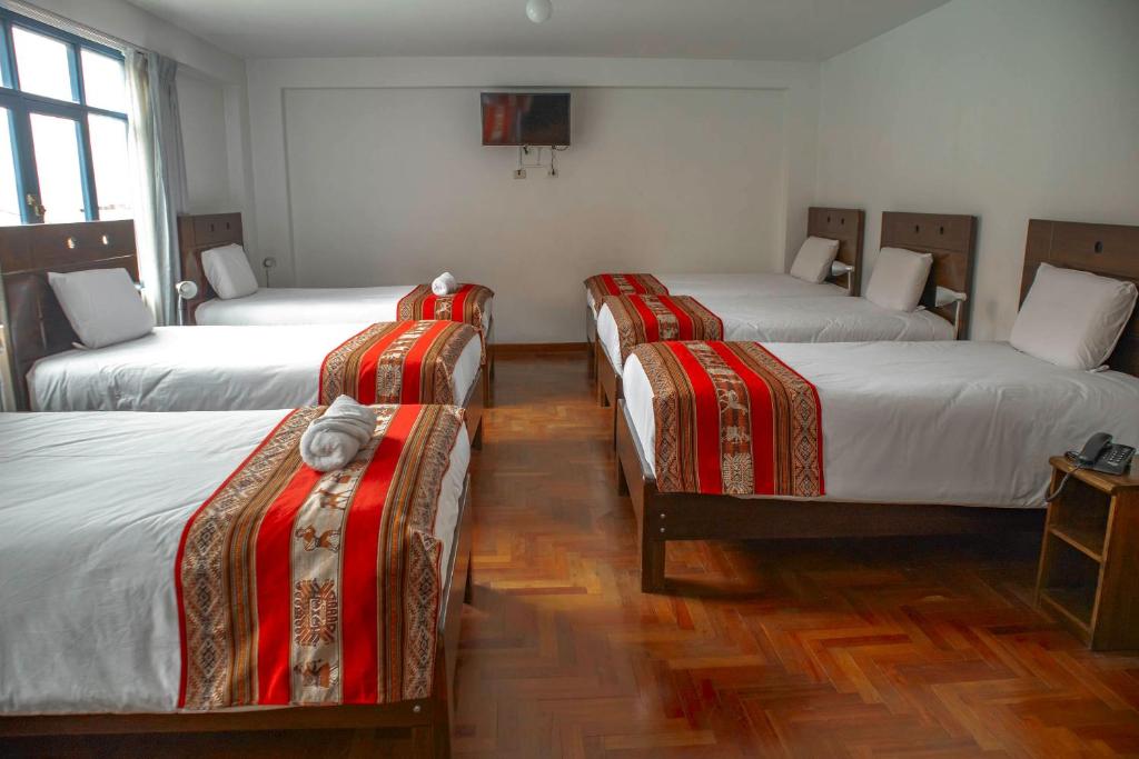 Postel nebo postele na pokoji v ubytování Hotel Del Prado Hometown