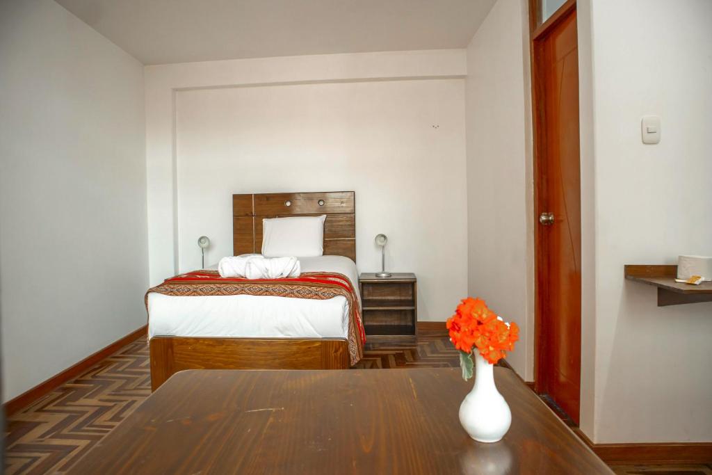 Postel nebo postele na pokoji v ubytování Hotel Del Prado Hometown