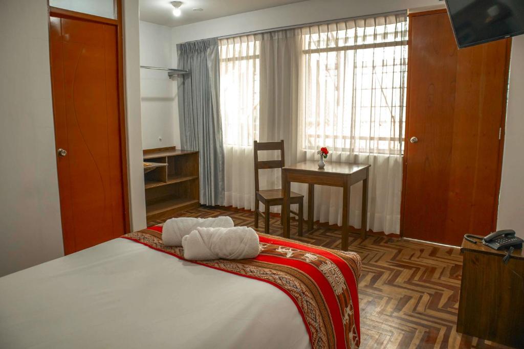 Postel nebo postele na pokoji v ubytování Hotel Del Prado Hometown