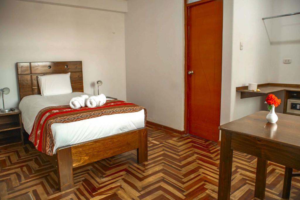Postel nebo postele na pokoji v ubytování Hotel Del Prado Hometown