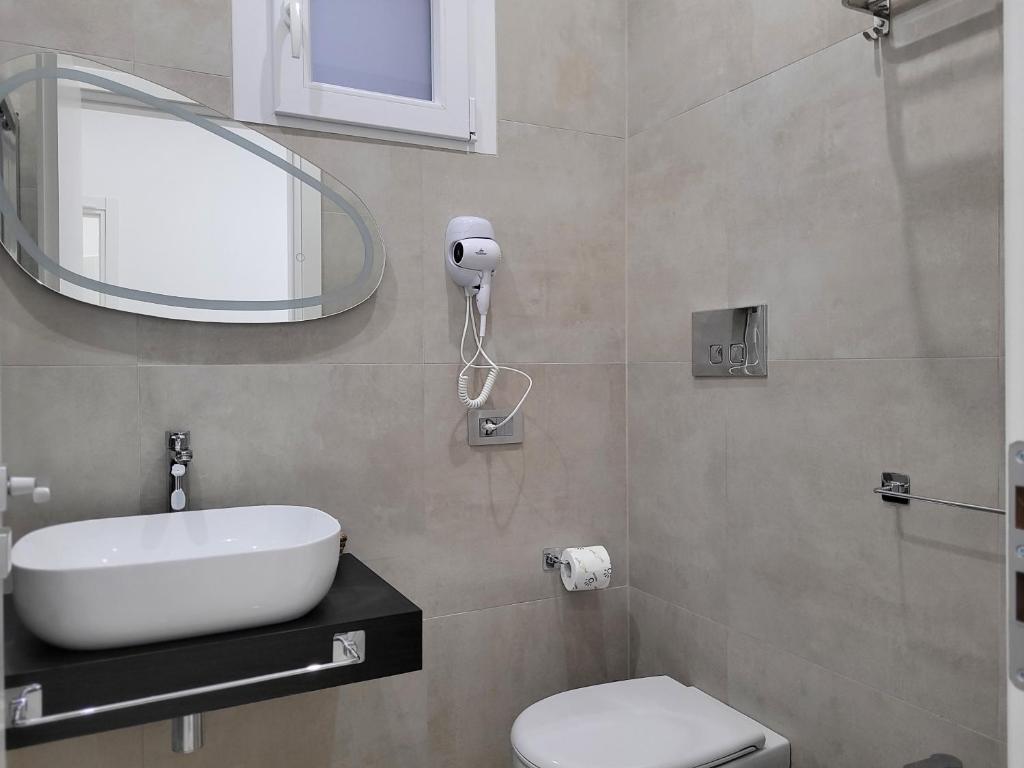 Koupelna v ubytování Gemini rooms