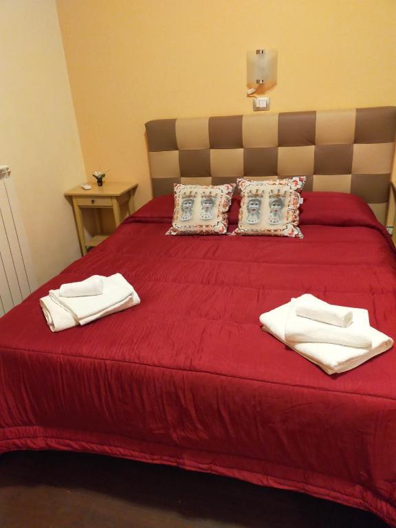 Postel nebo postele na pokoji v ubytování Bed & Breakfast Hostel H24