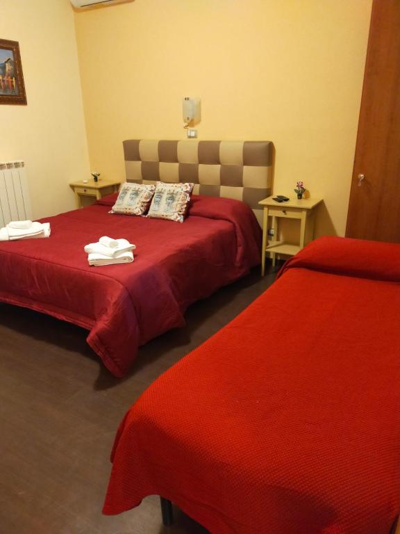 Postel nebo postele na pokoji v ubytování Bed & Breakfast Hostel H24