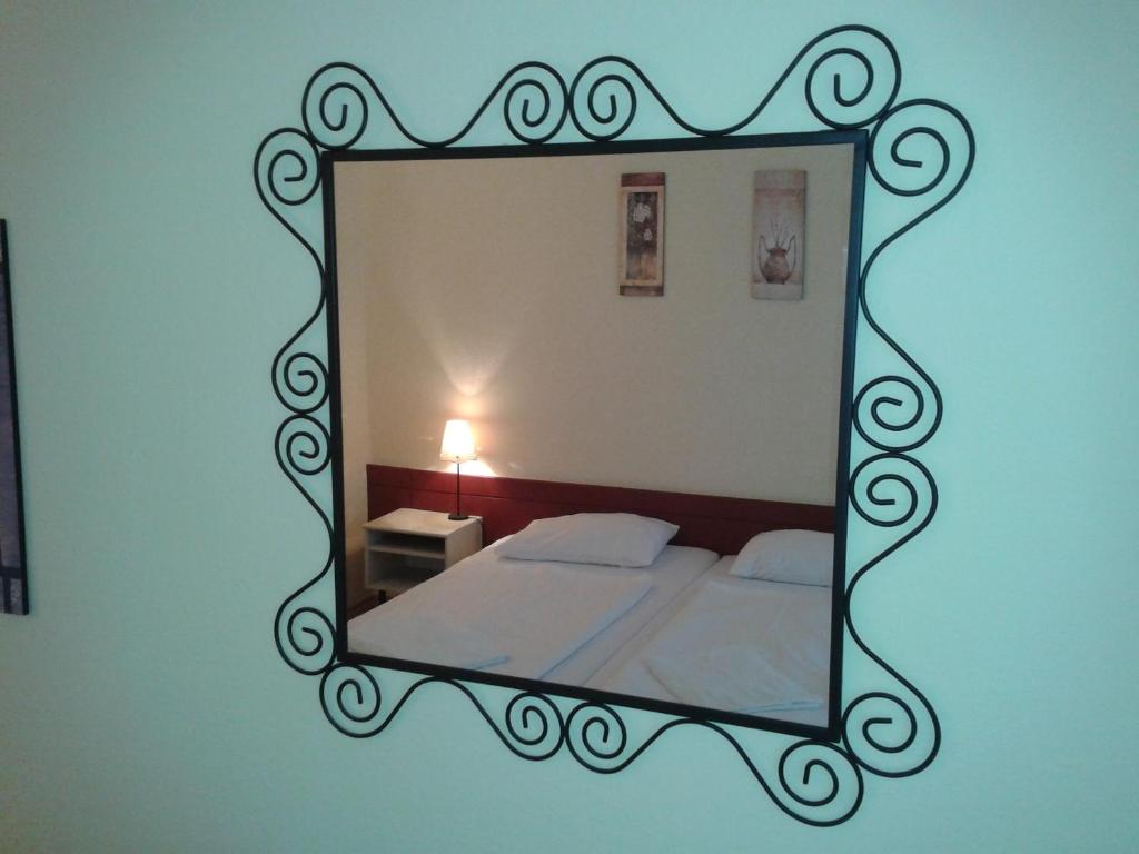 Postel nebo postele na pokoji v ubytování Bed Breakfast Hotel Budapest
