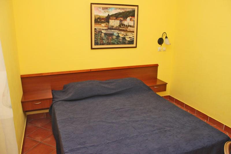 Postel nebo postele na pokoji v ubytování Garni Hotel Meduza