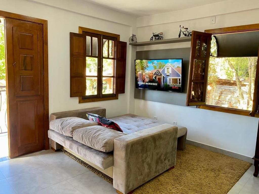 TV a/nebo společenská místnost v ubytování Villaggio dos Vinhedos