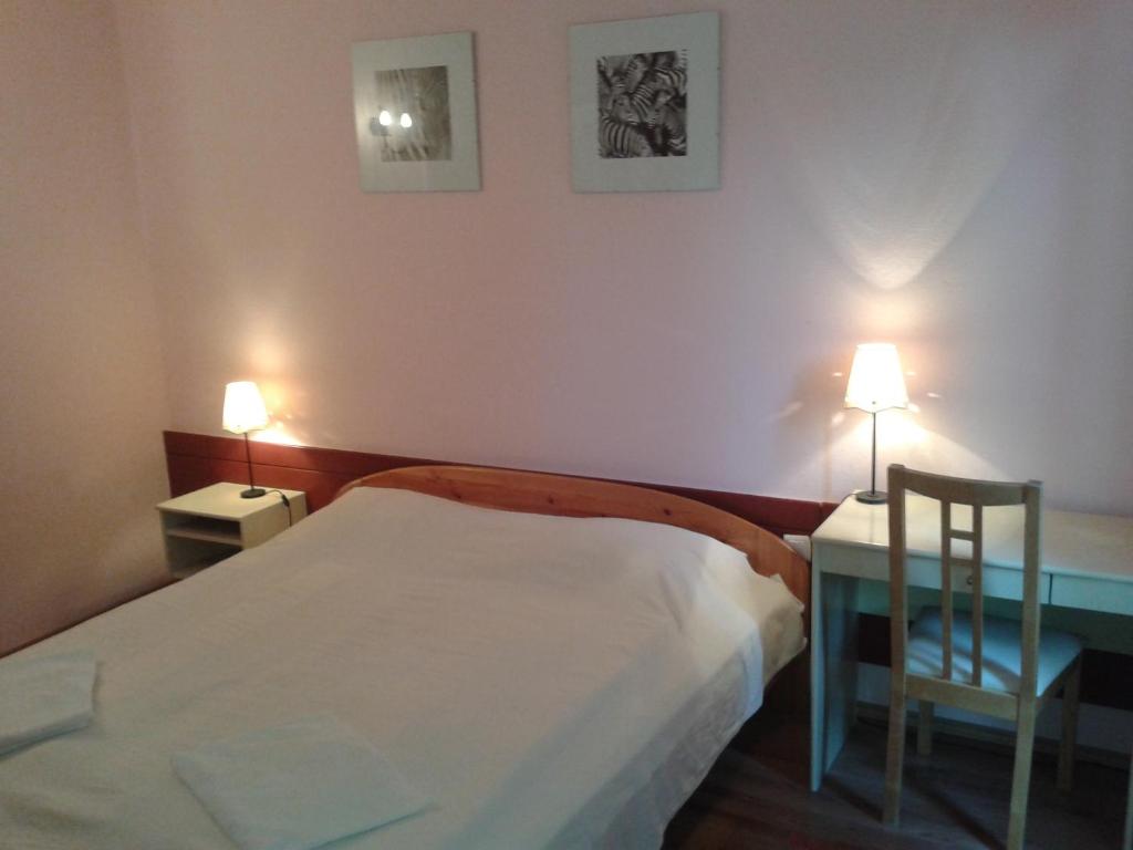 Postel nebo postele na pokoji v ubytování Bed Breakfast Hotel Budapest